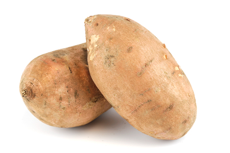 sweet potato isolated on white backgroundの写真素材