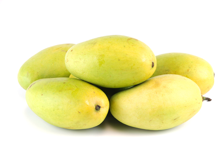 close up on fresh mangoes backgroundの写真素材