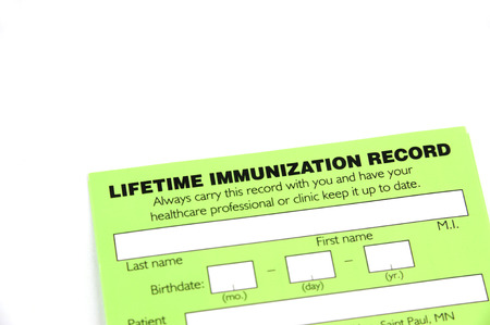 blank immunization record form isolated on white backgroundの写真素材