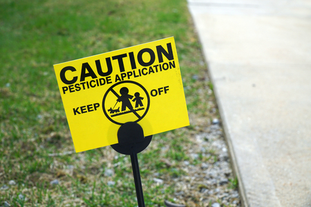 caution warning sign with text pesticide usedの写真素材