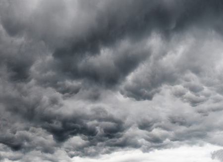 dramatic dark sky with storm cloud before thunder stormの写真素材