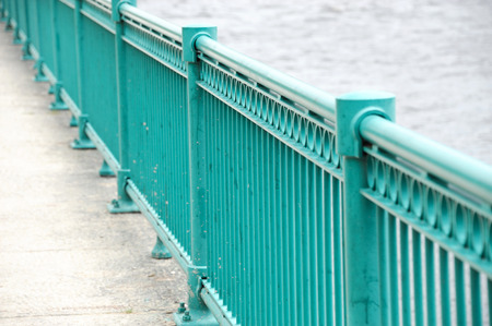 perspective view of railing on river bank
