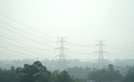 Power tower in the countryside in pollution day with mist