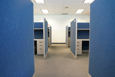 cubicles inside office building, place of workの写真素材