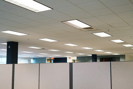 cubicles inside office building, place of workの写真素材