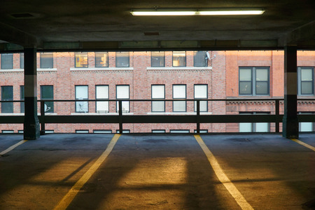 sunlight and shade in parking lot in the cityの写真素材