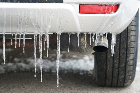 Close up on Icicle on the car in winter morningの写真素材