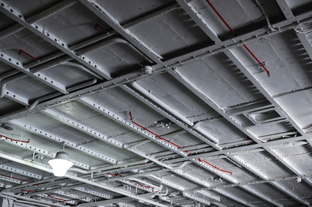 interior view of warehouse ceiling with bright lightの写真素材