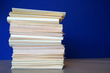 close up on the stacking documents and folders