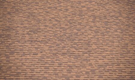 close up on brown roof shingle background