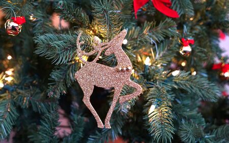 Close up on Christmas tree with different decorationの写真素材