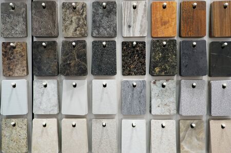 hanging granite color and pattern sample cards in the storeの写真素材