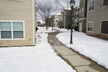 apartment community residential area after snow stormの写真素材