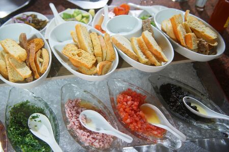 close up on fresh buffet food in the restaurantの写真素材