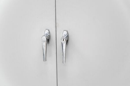 close up on handles on the cabinetの写真素材