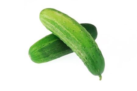 close up on cucumbers isolated on white backgroundの写真素材