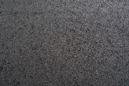 new paved road surface asphalt backgroundの写真素材