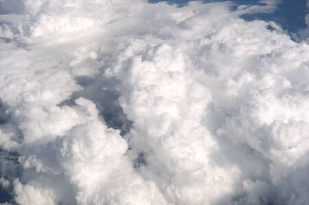 aerial view of cumulus cloud from planeの写真素材