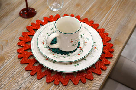 decorative Christmas dishware on the tableの写真素材