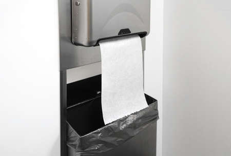 close up on paper towel dispenser on the wallの写真素材