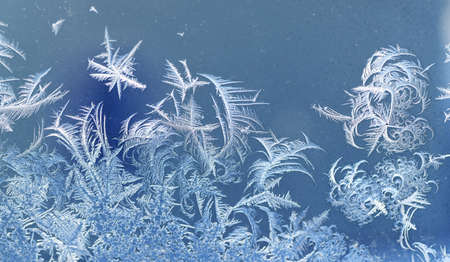 frost crystal on window glass in winter seasonの写真素材