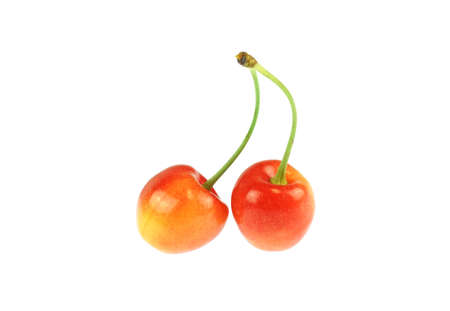 close up on yellow cherries isolated on white background