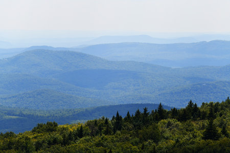 landscape of mountains range in summer mistの写真素材