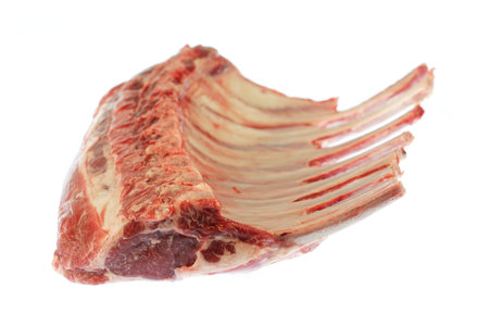 raw French lamb steak chop isolated on white backgroundの写真素材