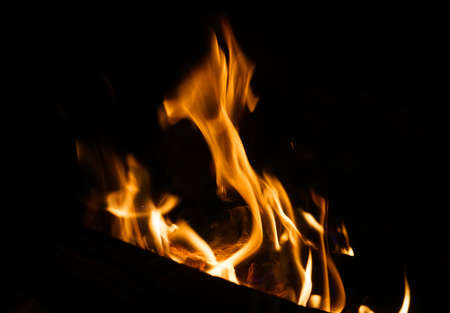 burning fire flame on the black backgroundの写真素材