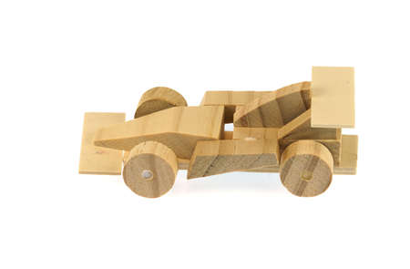 wooden race car isolated on white backgroundの写真素材