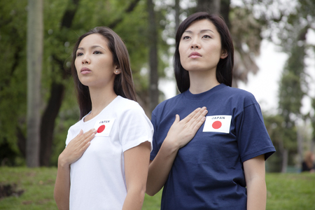 Young women supporting the Japan women's national football teamの写真素材