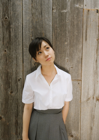 Teenage school girl looking upの写真素材
