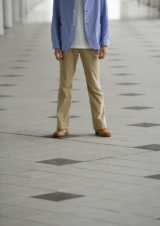 Standing young manの写真素材