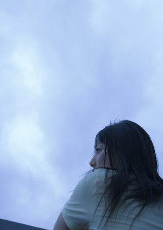 Young woman looking awayの写真素材