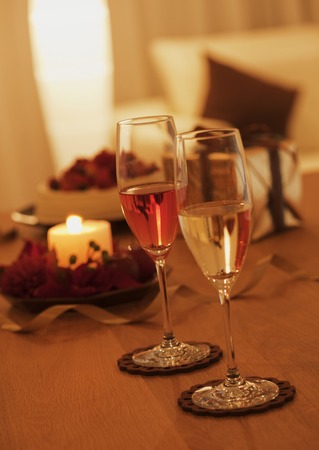 Champagne glass and candleの写真素材