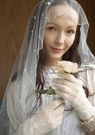 Bride holding rose