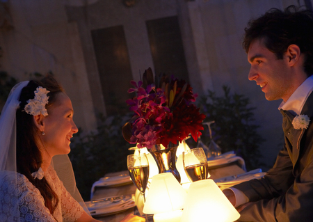 Bridal couple facing each otherの写真素材