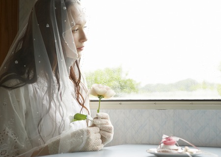 Bride holding roseの写真素材
