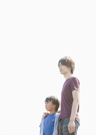 Father and son standingの写真素材