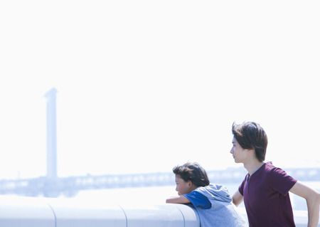 Father and son looking awayの写真素材