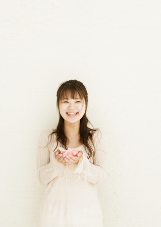 Woman Holding Flowerの写真素材
