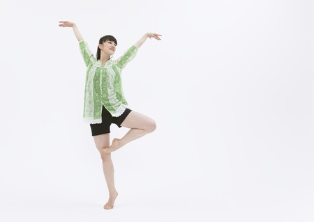 Young woman dancingの写真素材