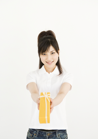 Woman Offering Presentの写真素材