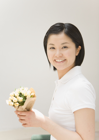 Woman Holding Bouquetの写真素材