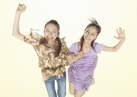 Young women jumpingの写真素材