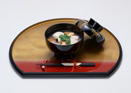 Rice cakes boiled with vegetablesの写真素材