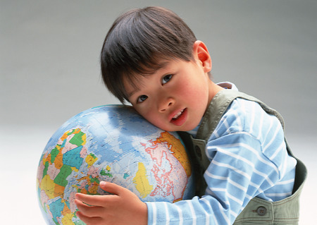 Terrestrial Globe and Childの写真素材