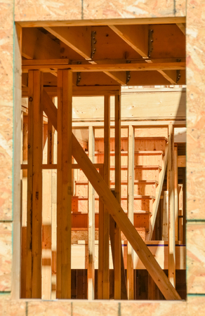 Future interior of new townhouse looked through a windowの写真素材