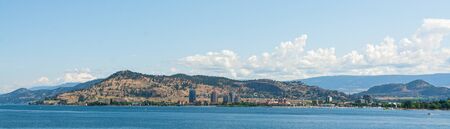 Panoramic view on Kelowna East bank over Okanagan lake on summer dayの写真素材