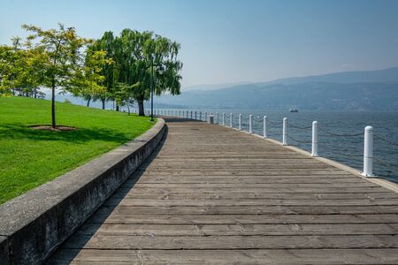 Walkway along the waterfront on Okanagan lake in British Columbiaの写真素材